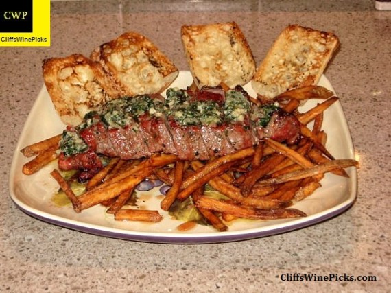 NY Strip with herb butter and fries